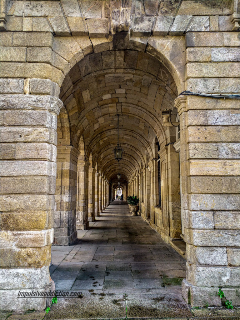 Arches of Raxoi Palace in Obradoiro Square